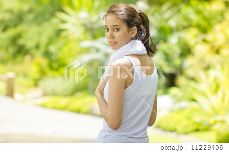 Young woman after fitness in the park 11229406
