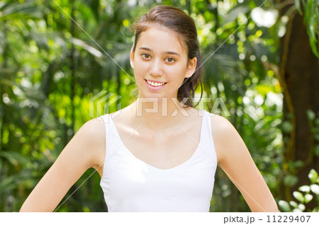 Healthy woman portrait in the park 11229407