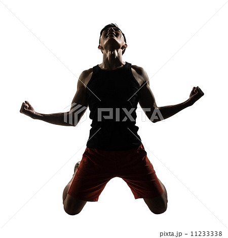 young athletic man kneeling 11233338