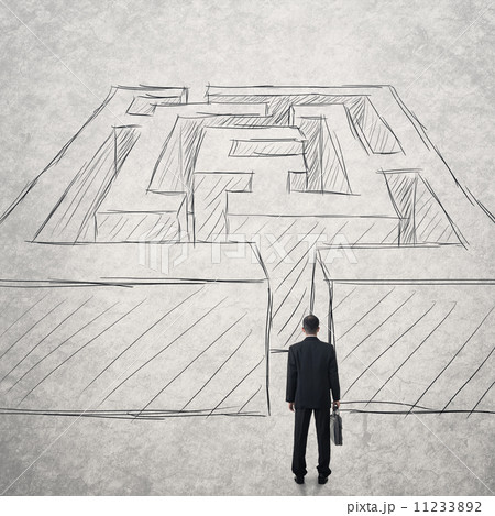 Businessman walk into a difficult maze Businessman walk into a difficult maze 11233892