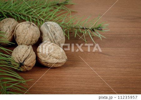 walnuts on wooden background walnuts on wooden background 11235957