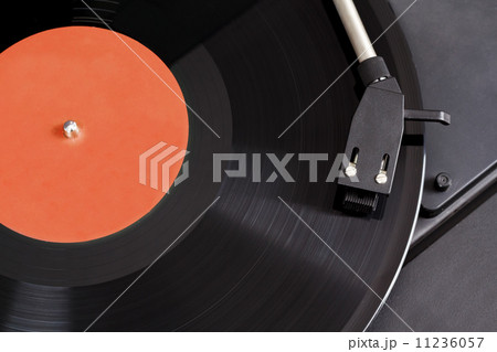 Vintage record player with spinning vinyl. Motion blur image. 11236057