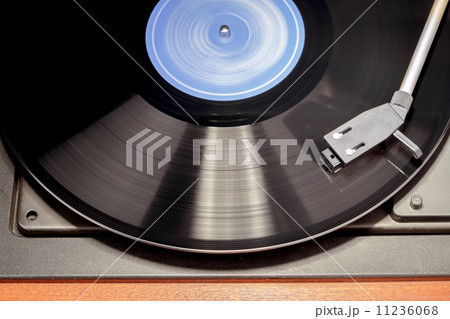 Vintage record player with spinning vinyl. Motion blur image. Vintage record player with spinning vinyl. Motion blur image. 11236068