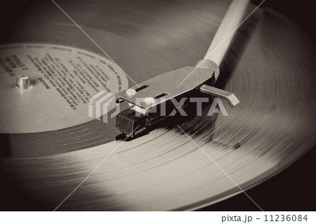 Vintage record player with spinning vinyl. Motion blur image. Vintage record player with spinning vinyl. Motion blur image. 11236084