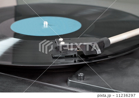 Vintage record player with spinning vinyl. Motion blur image. Vintage record player with spinning vinyl. Motion blur image. 11236297