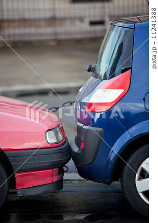 two closely parking cars 11241388