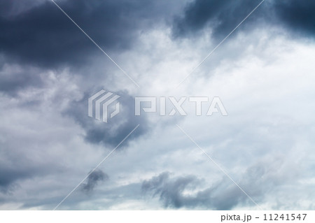 dark grey rainy clouds in summer 11241547