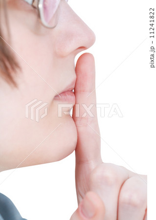 forefinger near lips - silence hand gesture 11241822