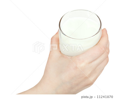 above view of hand holding glass of milk 11241870