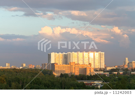 apartment house lit by sunset light in summer 11242003