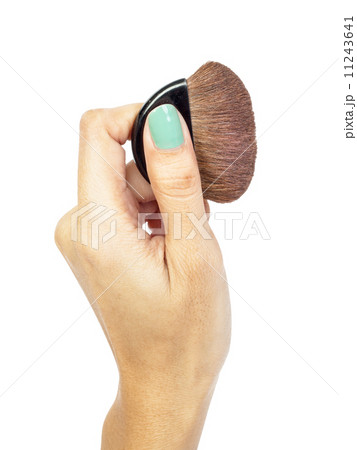 Cosmetic brush and hand 11243641