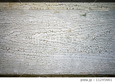 Background texture of an old wooden surface with cracked paint 11245661