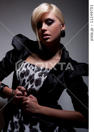 dark fashion blond girl 11249701