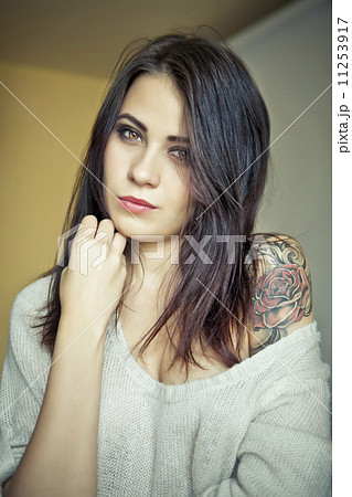 attractive girl with tattoo attractive girl with tattoo 11253917