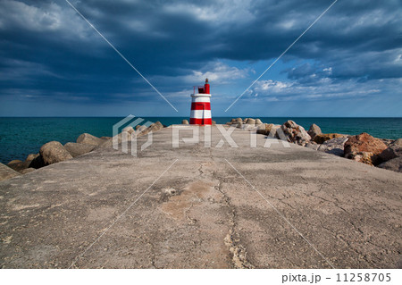 Lighthouse on the Tavira Island before storm, Algarve,Portugal 11258705
