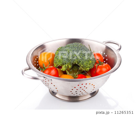Vegetables in colander. 11265351