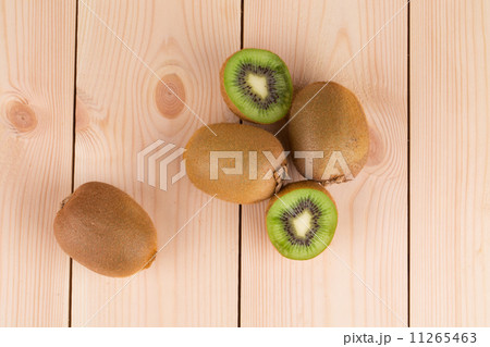Fresh kiwis on wooden ground 11265463