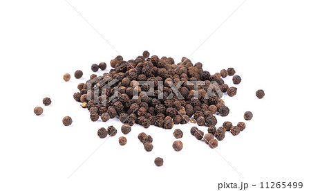 Heap of black spicy peppercorn. 11265499