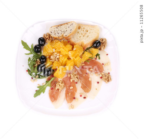 Salad with arugula and prosciutto. Salad with arugula and prosciutto. 11265508