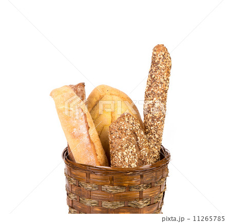 Fresh crispy baguettes in basket. Fresh crispy baguettes in basket. 11265785