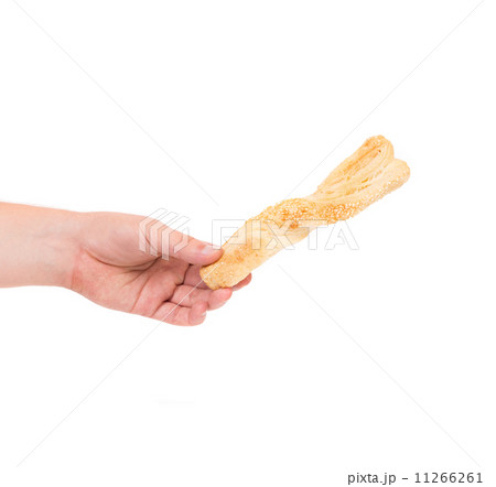 Hand holding crispy cracker. Hand holding crispy cracker. 11266261