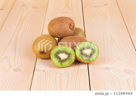 Ripe kiwi on wood table. Ripe kiwi on wood table. 11266404