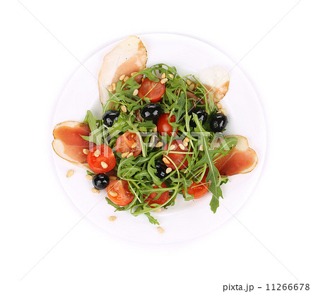 Salad with arugula and prosciutto. 11266678