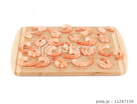 Boiled shrimps on cutting board. Boiled shrimps on cutting board. 11267156