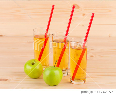 Fresh apple juice on wood. Fresh apple juice on wood. 11267157