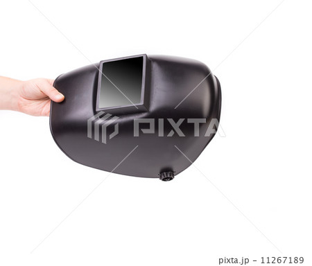 Hand holding welding mask. 11267189