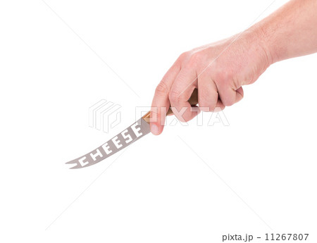 Hand holds cheese knife. 11267807