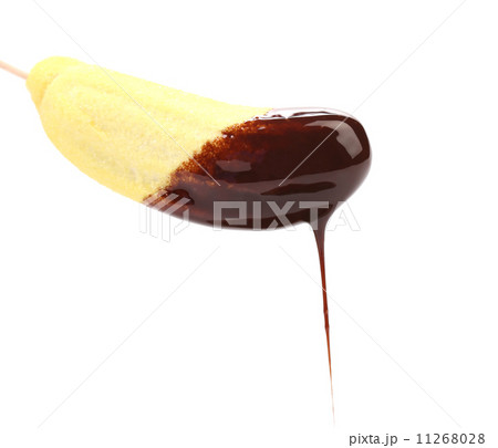 Sweet candy poured chocolate. 11268028