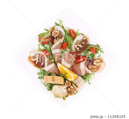 Salad with arugula and prosciutto. 11268105