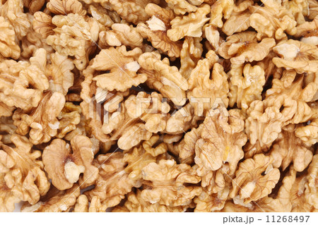 Walnut kernels as background. 11268497