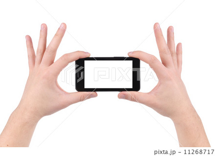 Hands holding smartphone. Hands holding smartphone. 11268717