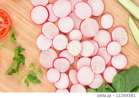 Wooden platter with vegetables. Wooden platter with vegetables. 11269381