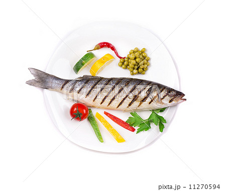 Grilled seabass with vegetables on plate. Grilled seabass with vegetables on plate. 11270594