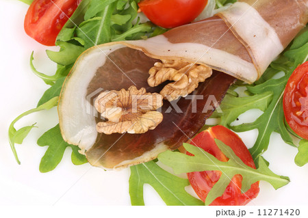 Salad with arugula and prosciutto. Salad with arugula and prosciutto. 11271420