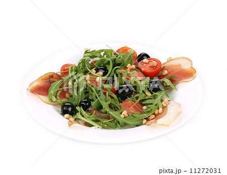 Salad with arugula and prosciutto. 11272031
