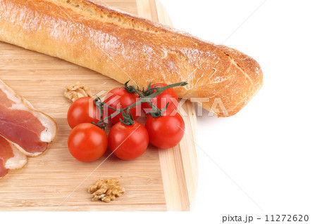 Prosciutto with cherry tomatoes and walnuts. Prosciutto with cherry tomatoes and walnuts. 11272620