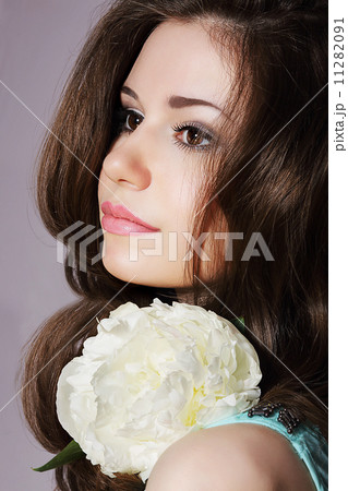 Tender Daydreaming Girl with White Peony Closeup Tender Daydreaming Girl with White Peony Closeup 11282091