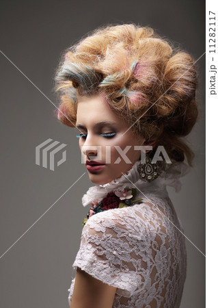 Individuality. Haute Couture. Swanky Woman with Colored Hair 11282117