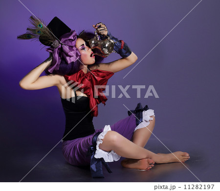 Stylized Harlequin in Fancy Cylinder Drinking from Jar 11282197