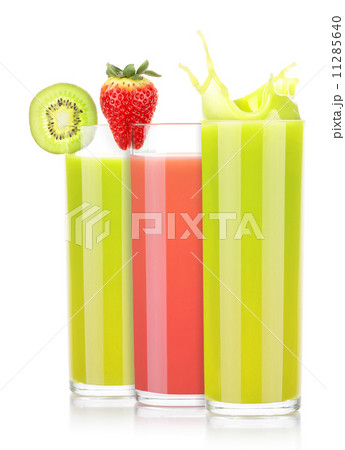 tasty summer fruit drinks in glass with splash 11285640