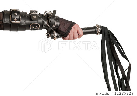 Hand in Leather Cuffs with Lash Isolated 11285825