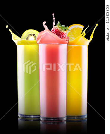 tasty summer fruits with juice in glass 11285858