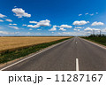 Blue sky with clouds over asphalt road 11287167