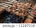 Cooking marinated shashlik 11287216