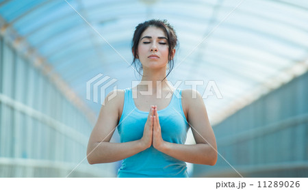 Young woman prayer position Young woman prayer position 11289026