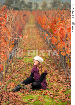 Beautiful young woman in the vineyard 11294292